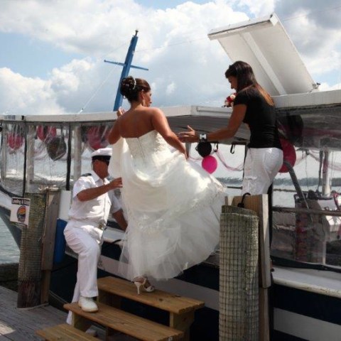 a man standing next to a dock