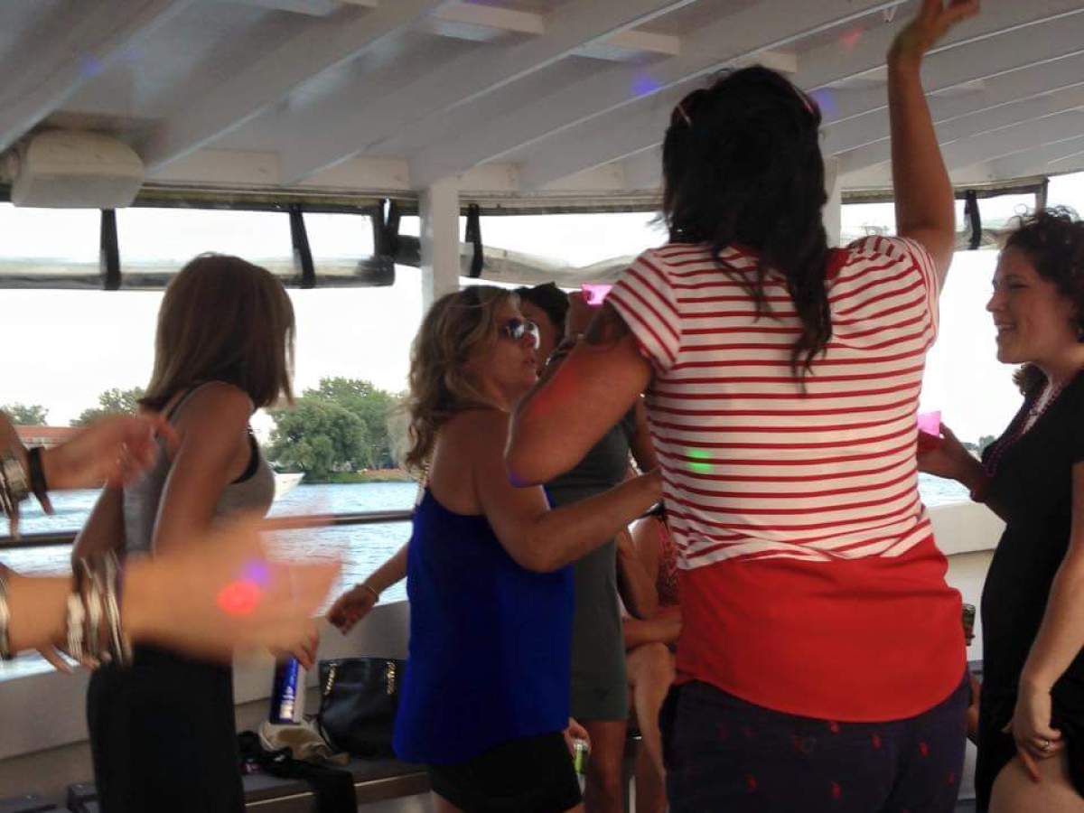 a group of people standing in a room