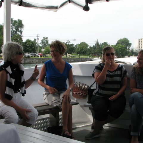a couple of people that are sitting on a bench
