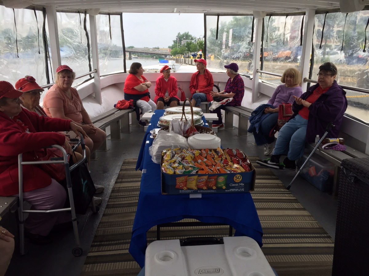 a group of people sitting around a table