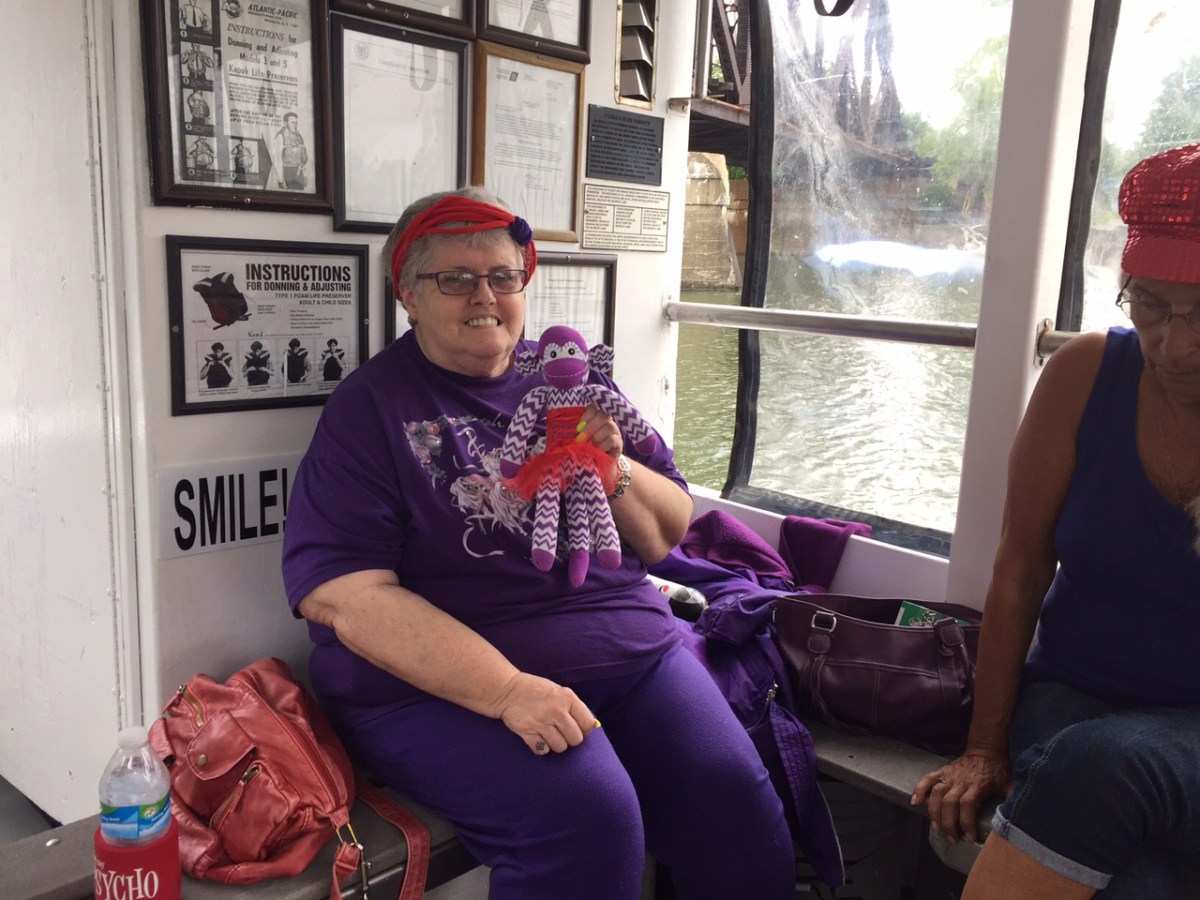 a man and a woman sitting on a bench