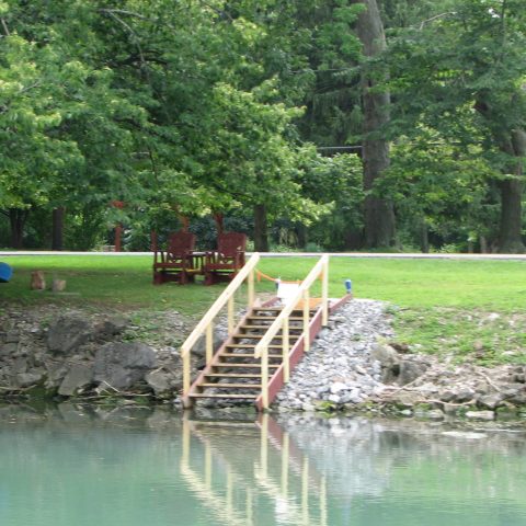 a group of people in a pool of water