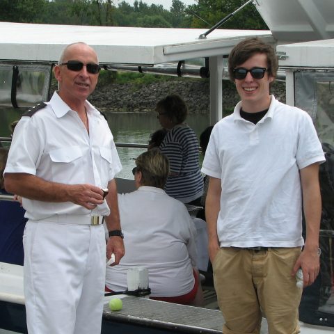 a man standing in front of a building