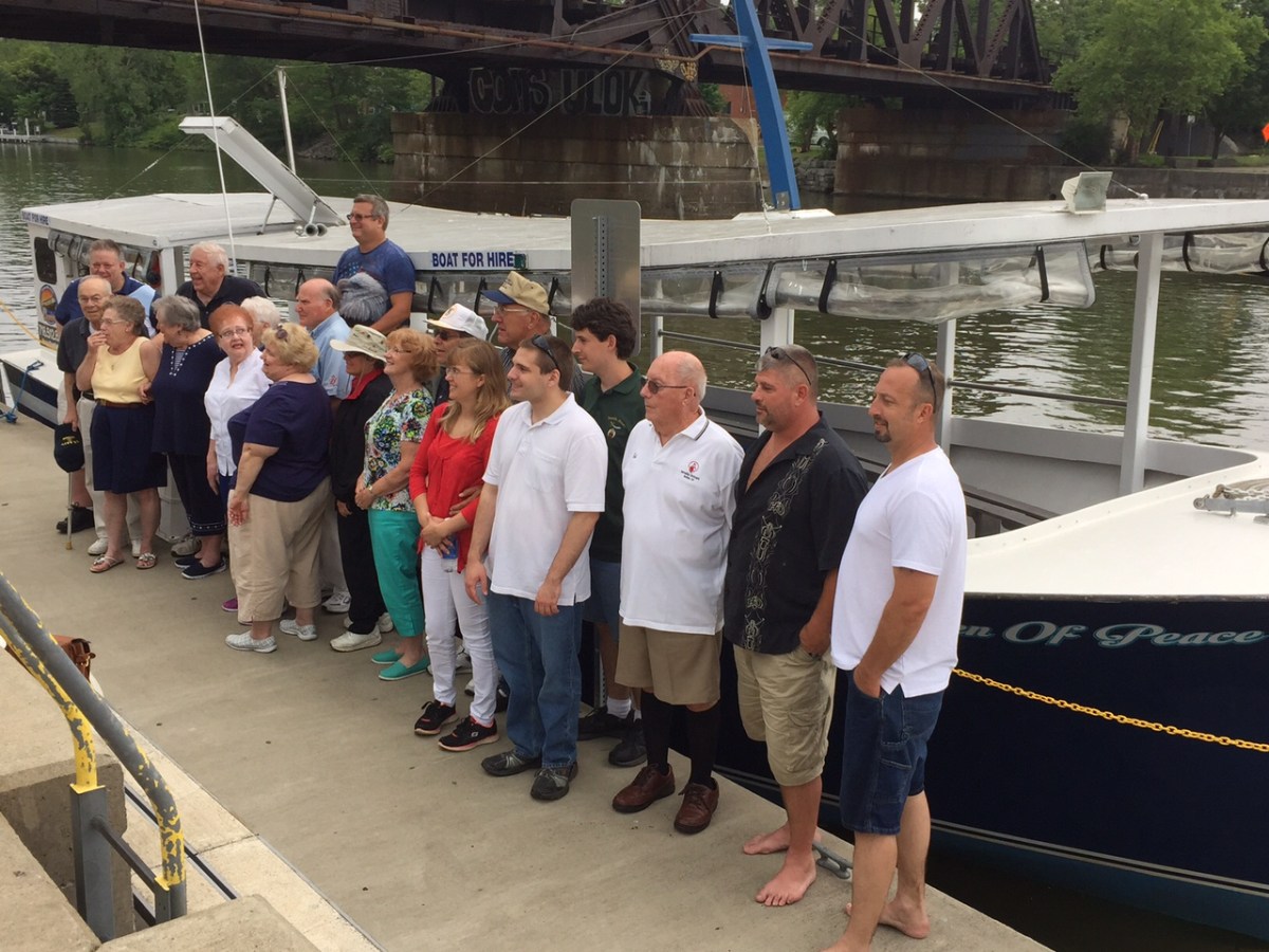 a group of people standing in front of a building