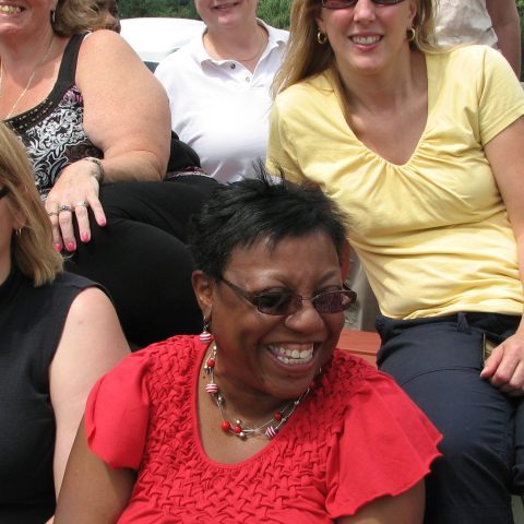 a group of people posing for the camera