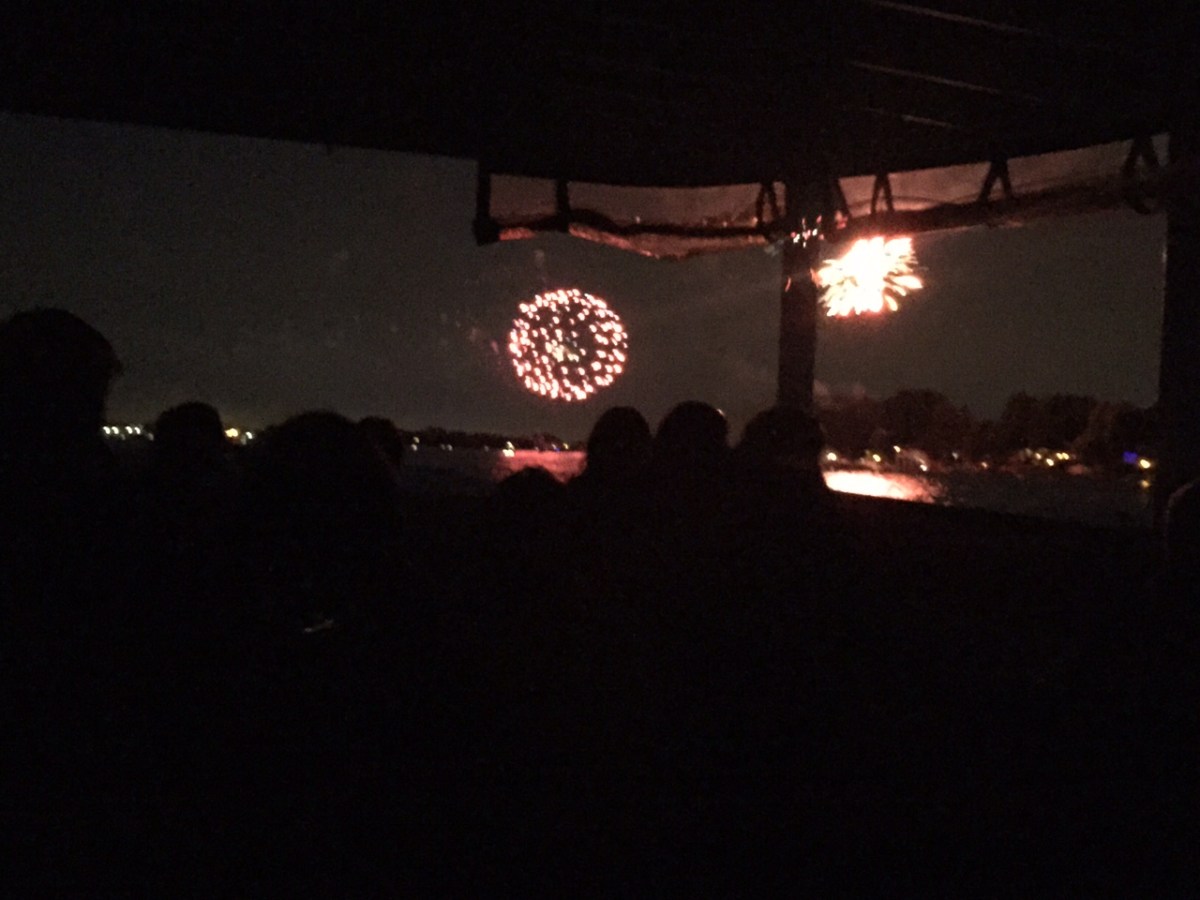 a crowd of people in a dark room