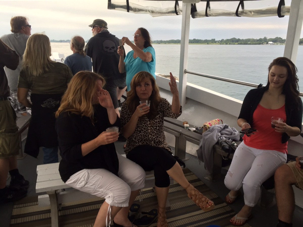 Wendy Glass et al. sitting on a bench