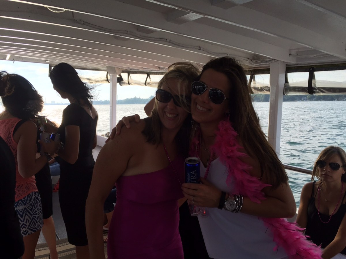 a couple of people that are standing in the water