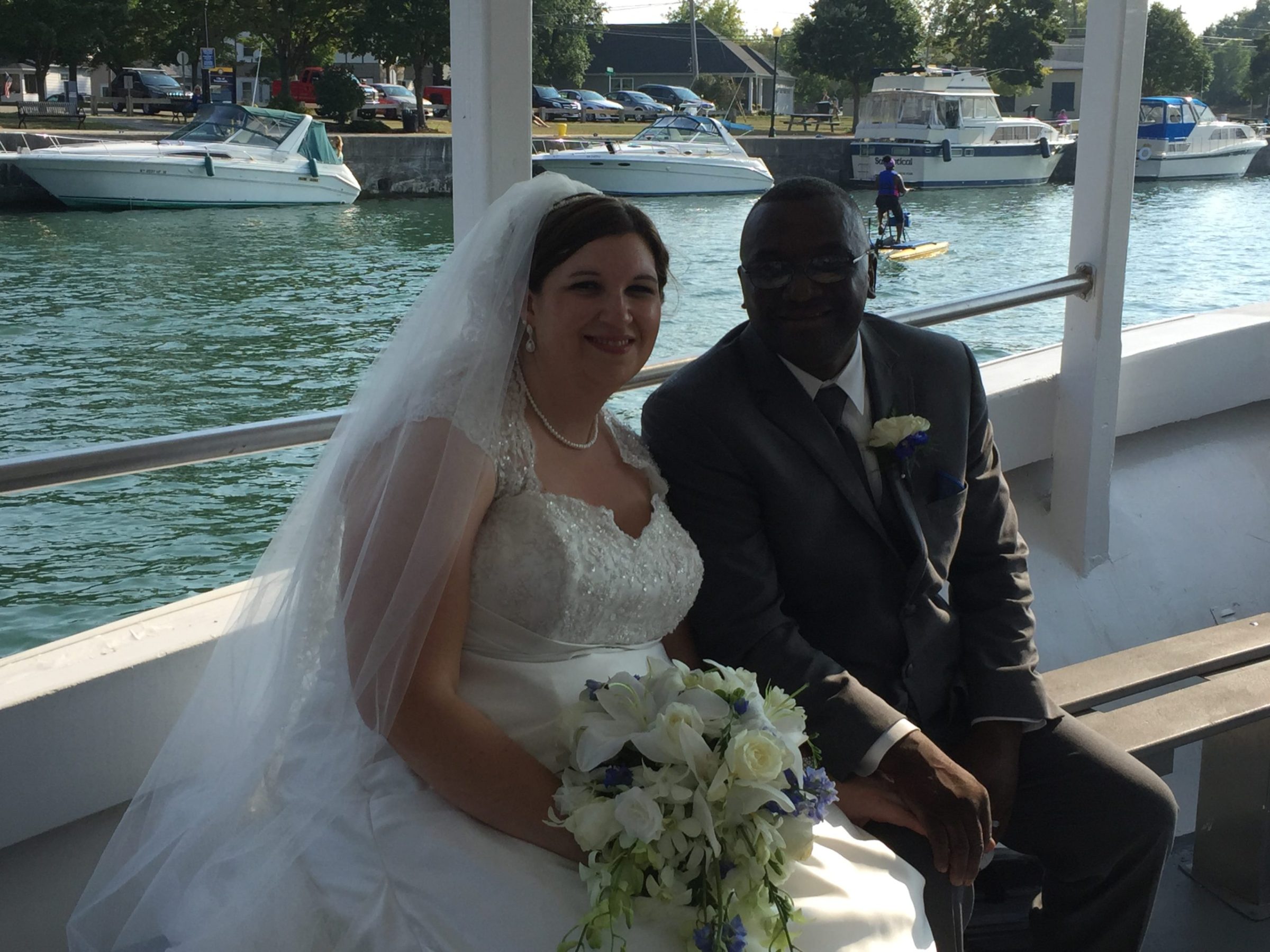 a couple of people that are standing in the water