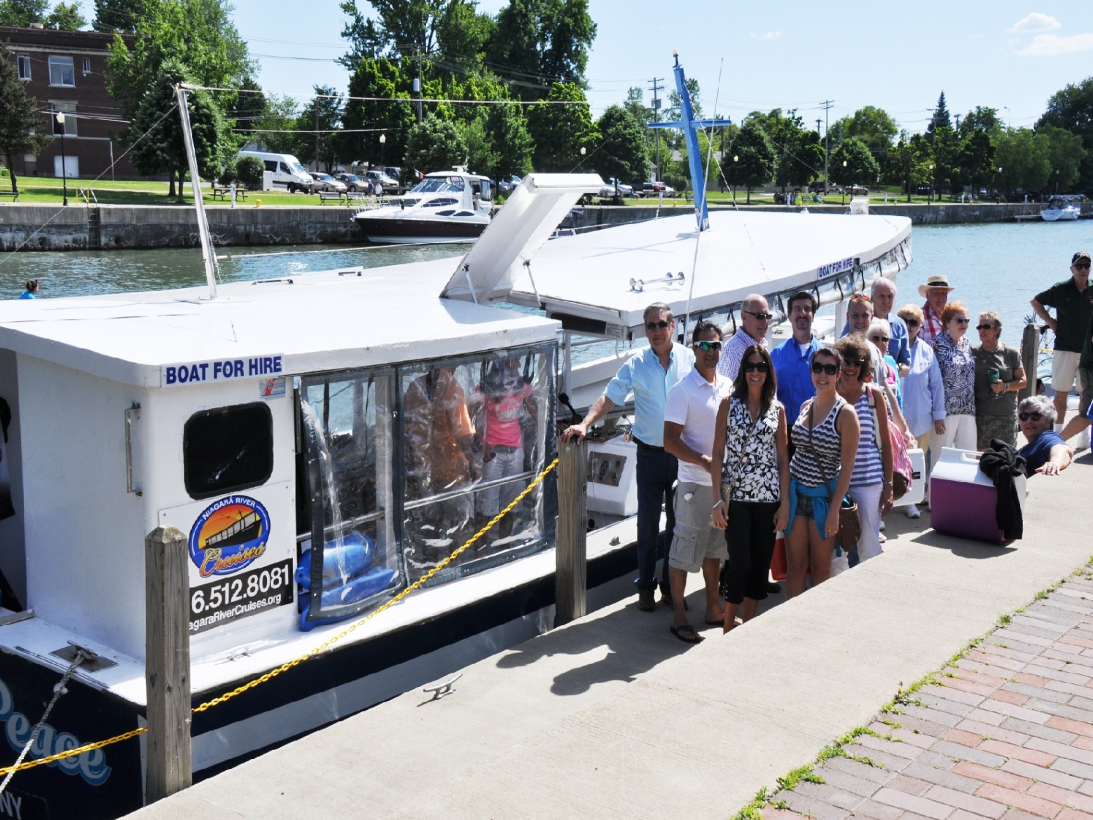 a group of people standing around a bus