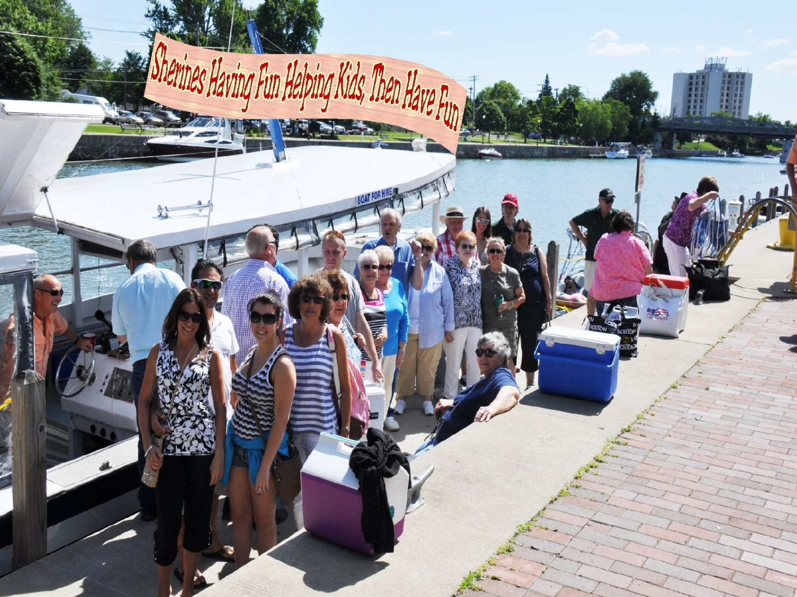 a group of people standing on a sidewalk