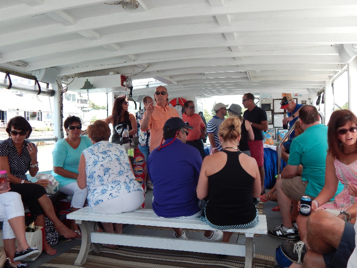a group of people sitting on a bench
