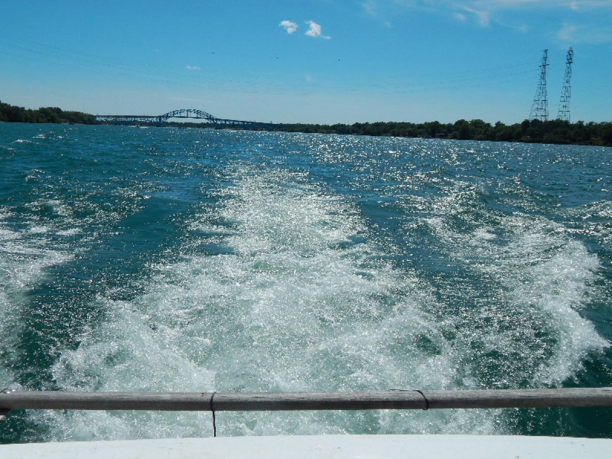 a man riding a wave on top of a body of water