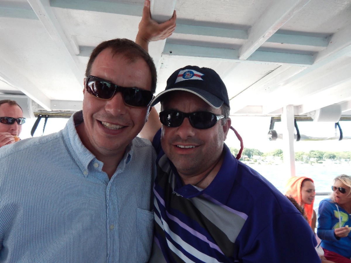 a man wearing sunglasses posing for the camera