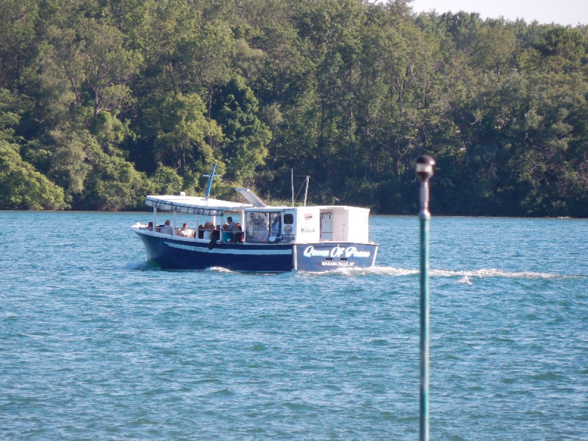 a small boat in a body of water