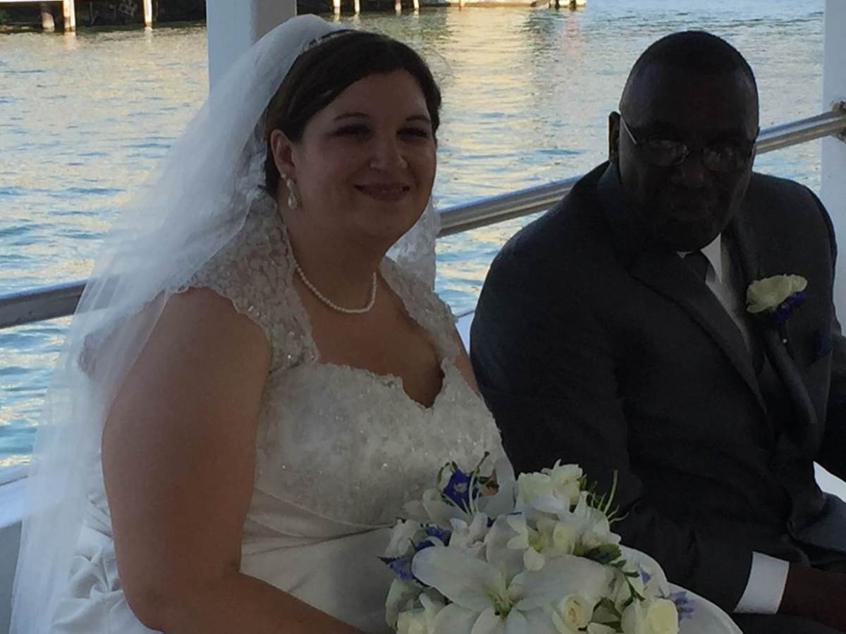 a woman sitting on a boat in the water