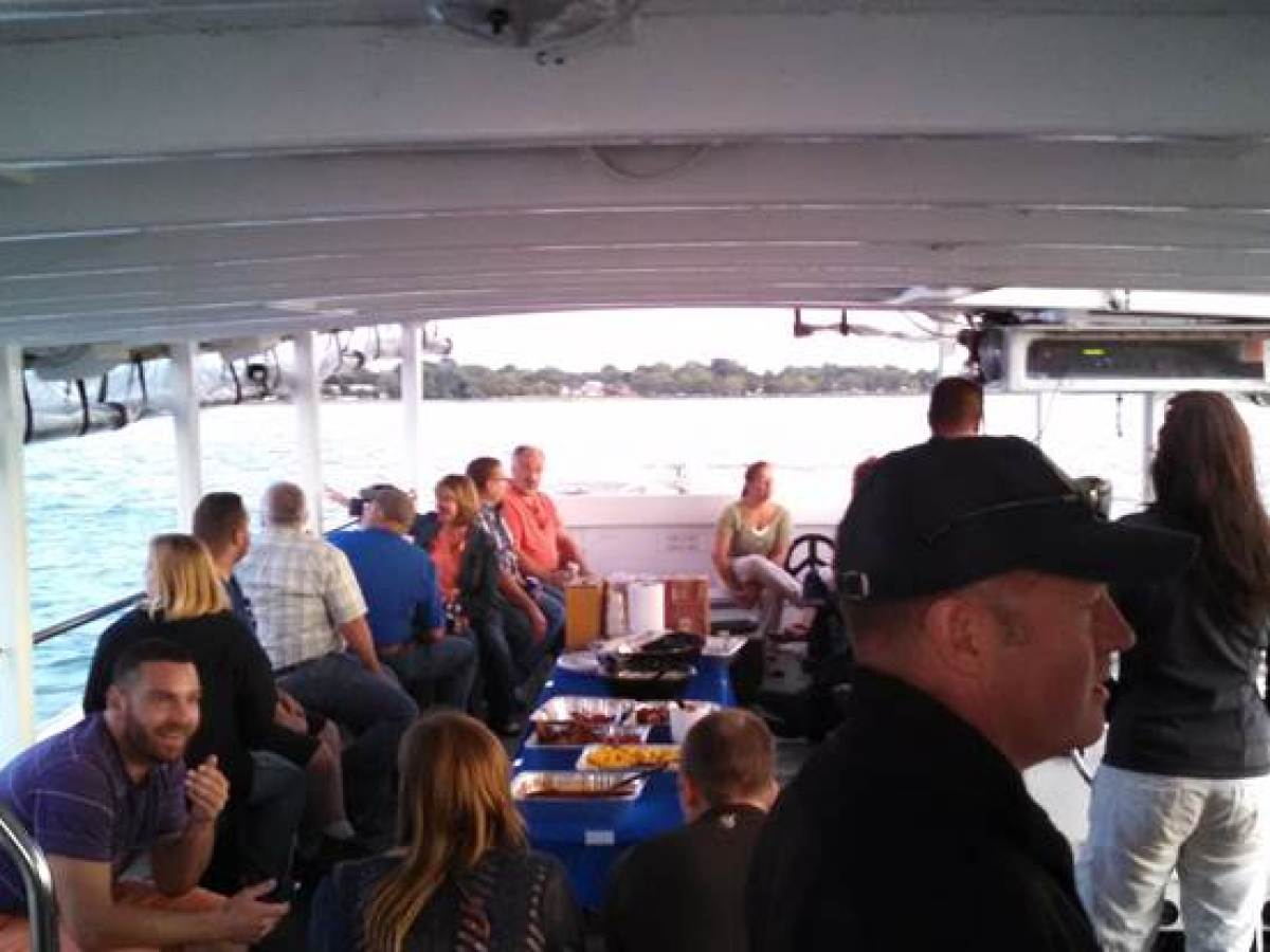 a group of people standing in front of a crowd