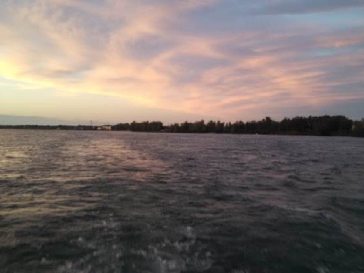 a sunset over a body of water