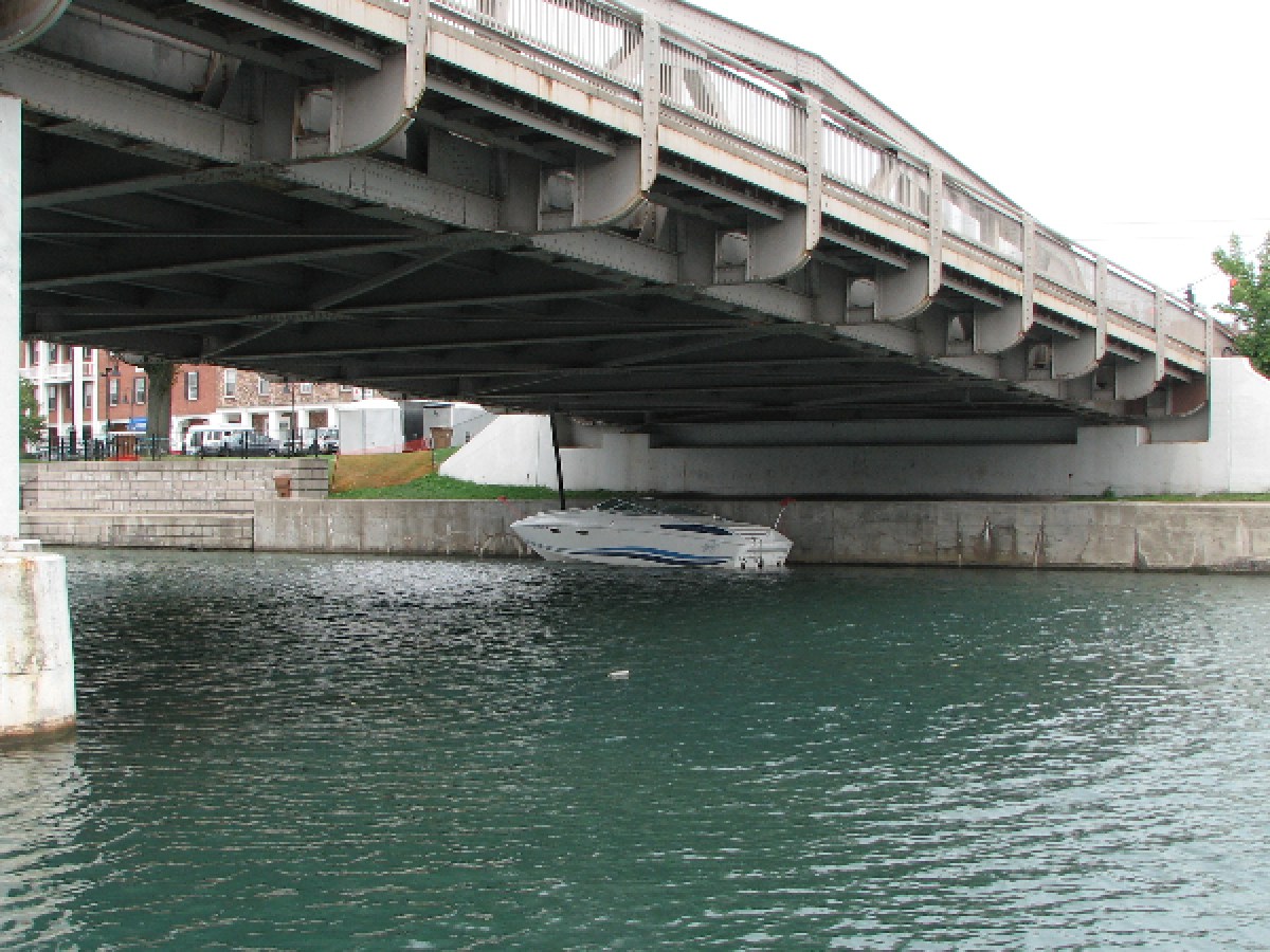 a train crossing a bridge over water