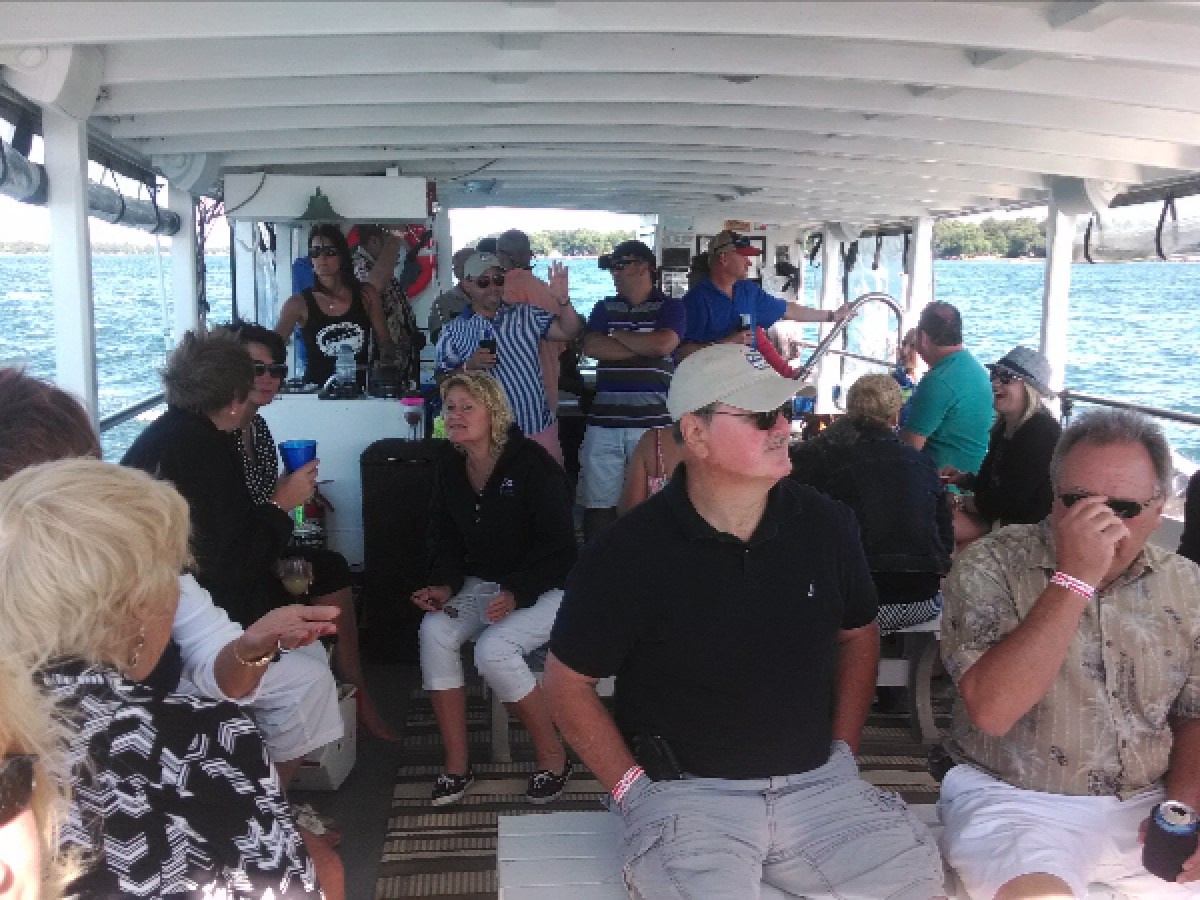 a group of people standing in front of a window
