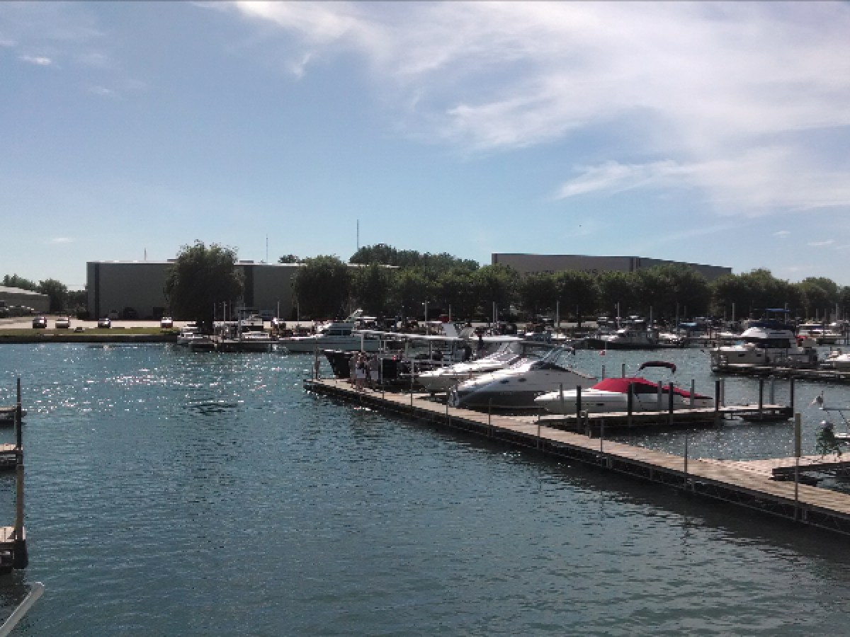 a boat is docked next to a body of water