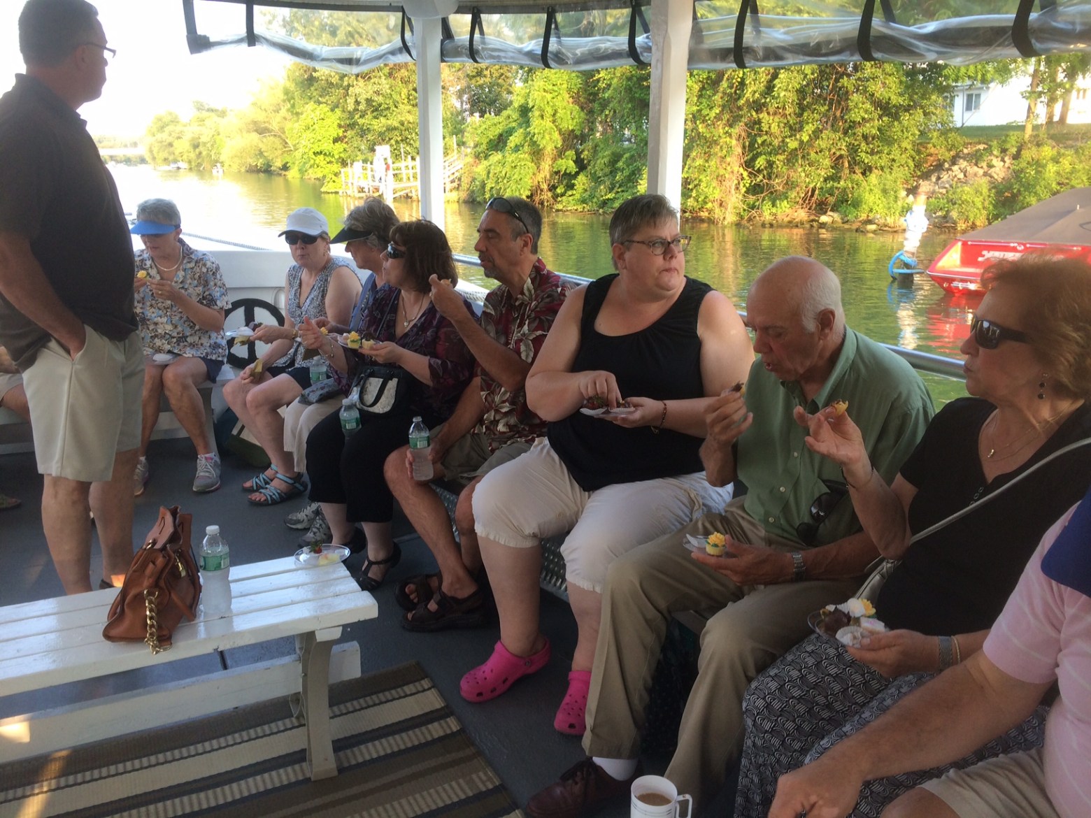 a group of people sitting on a bench