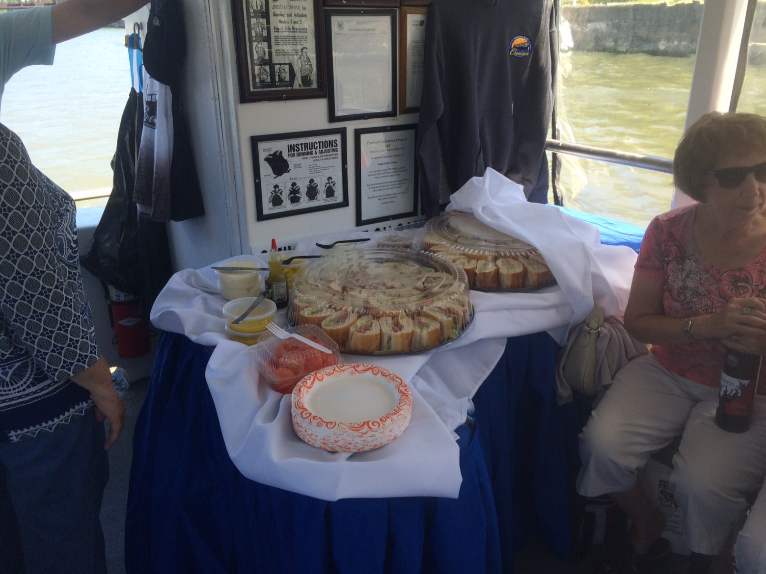 a person holding a tray of food