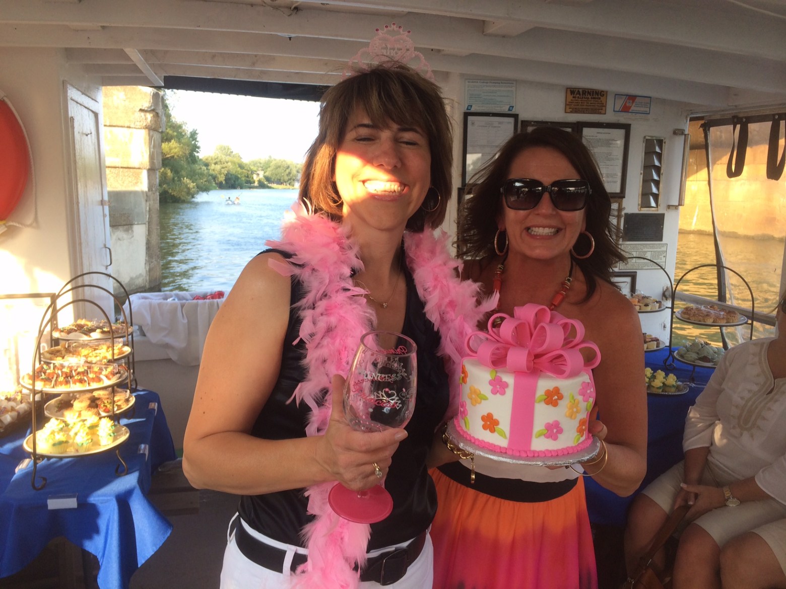 a person holding a birthday cake