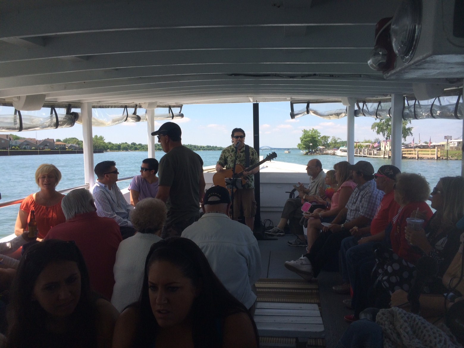 a group of people sitting in a restaurant