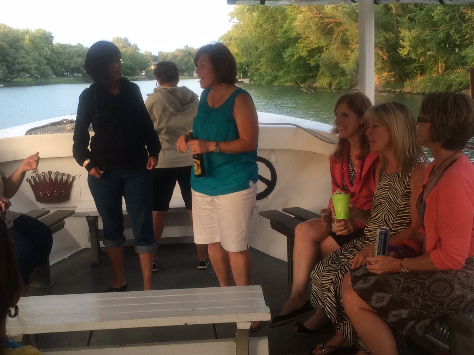 a group of people standing around a bench