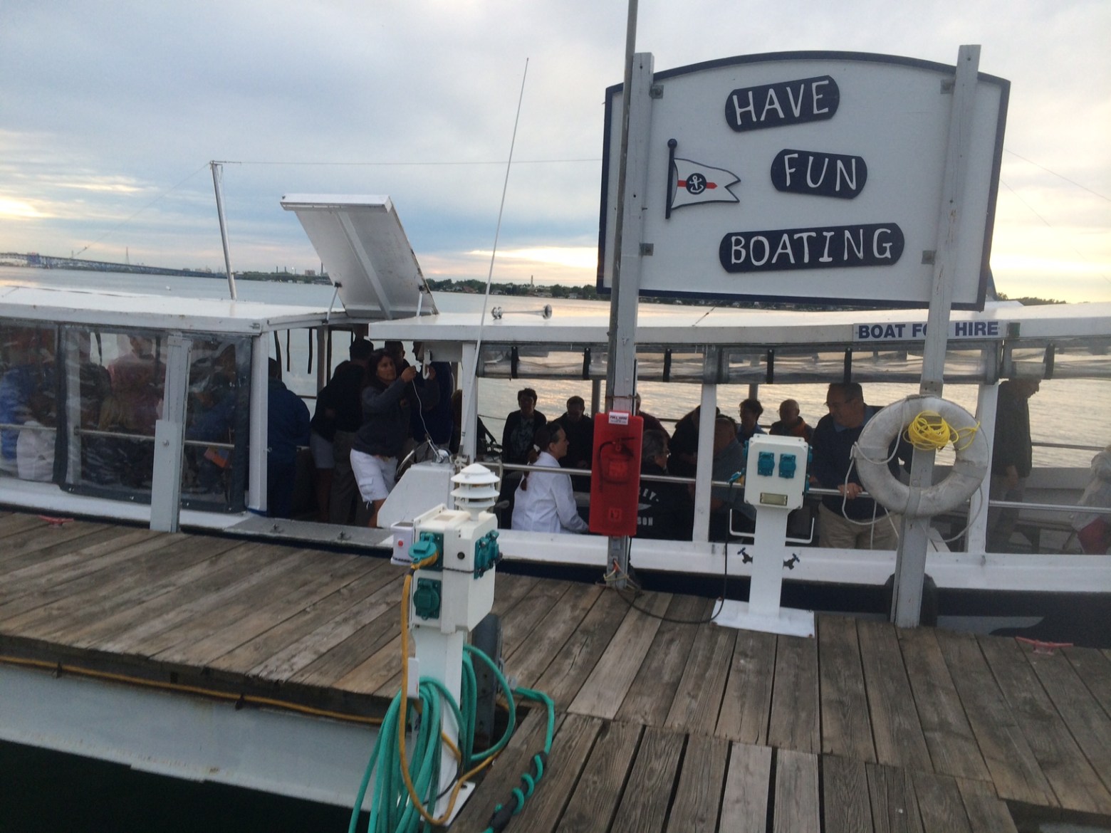 a group of people standing around a plane