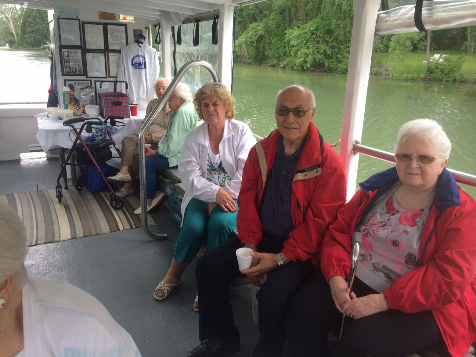 a group of people sitting on a bench