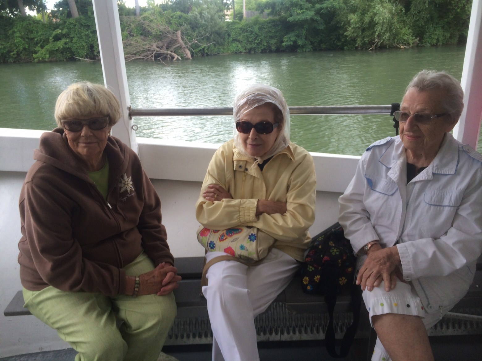 a group of people sitting on a bench