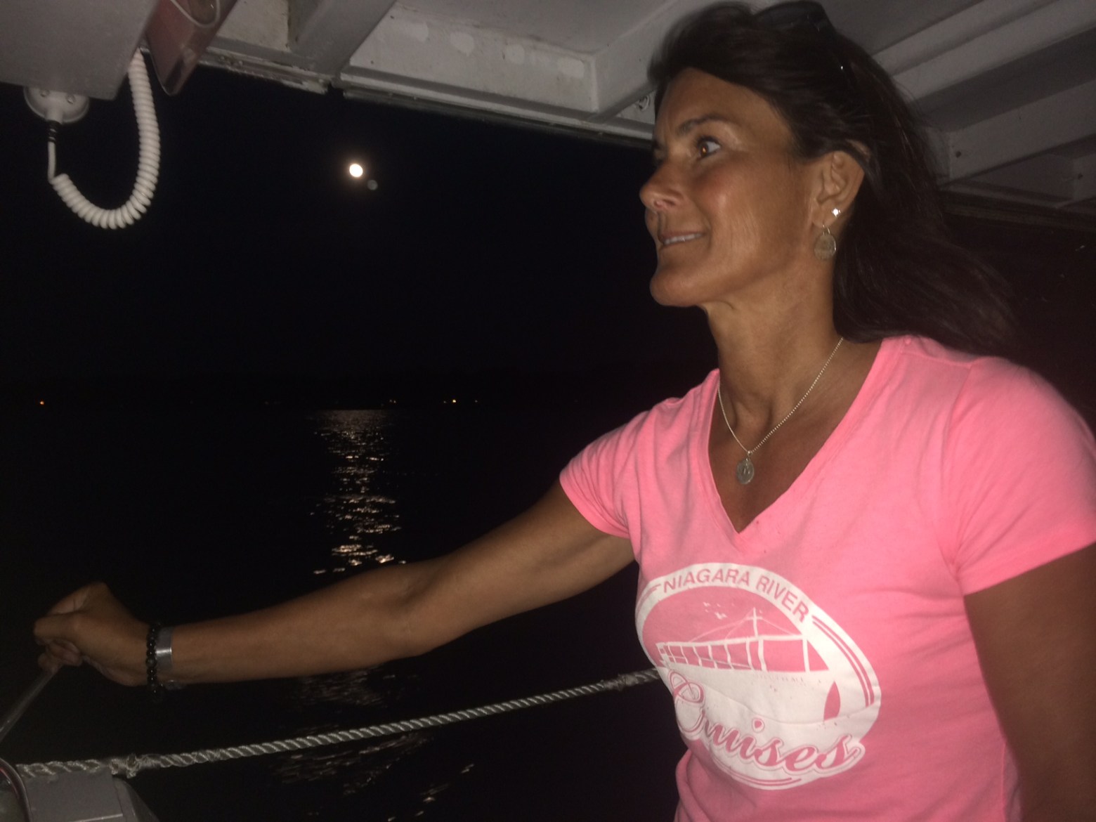 a woman in a pink shirt