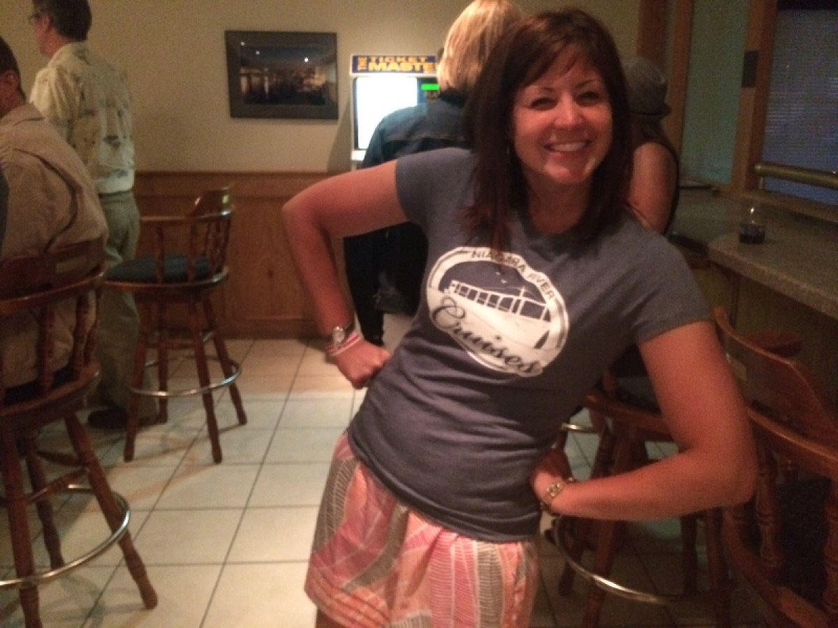a woman standing in a kitchen