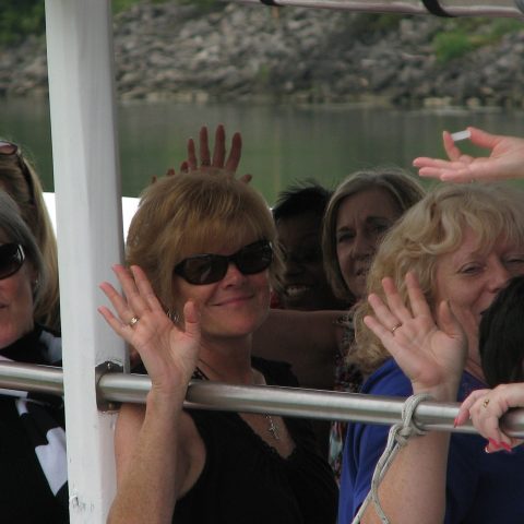 a group of people that are brushing their teeth
