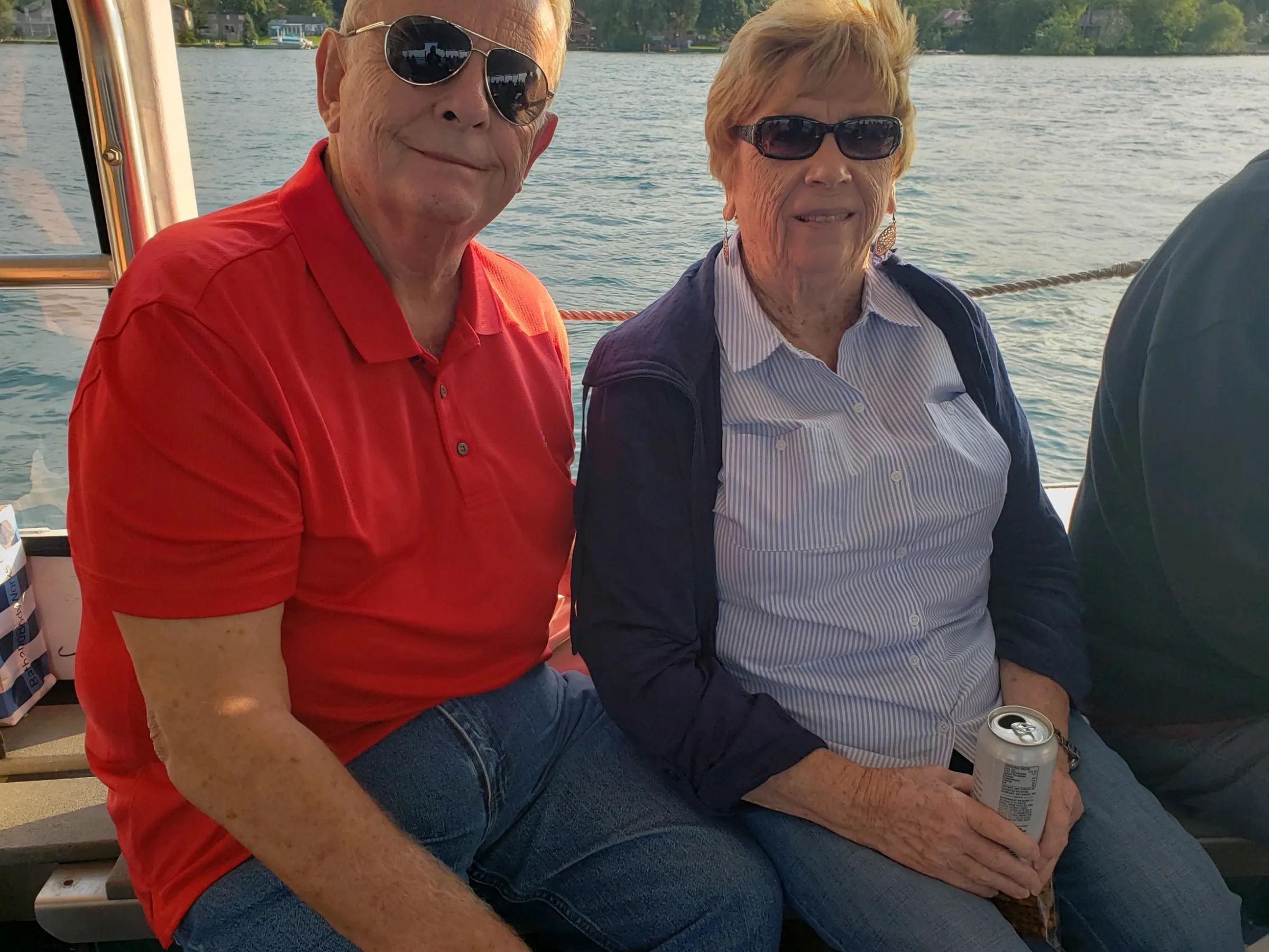a couple of people that are sitting in the water