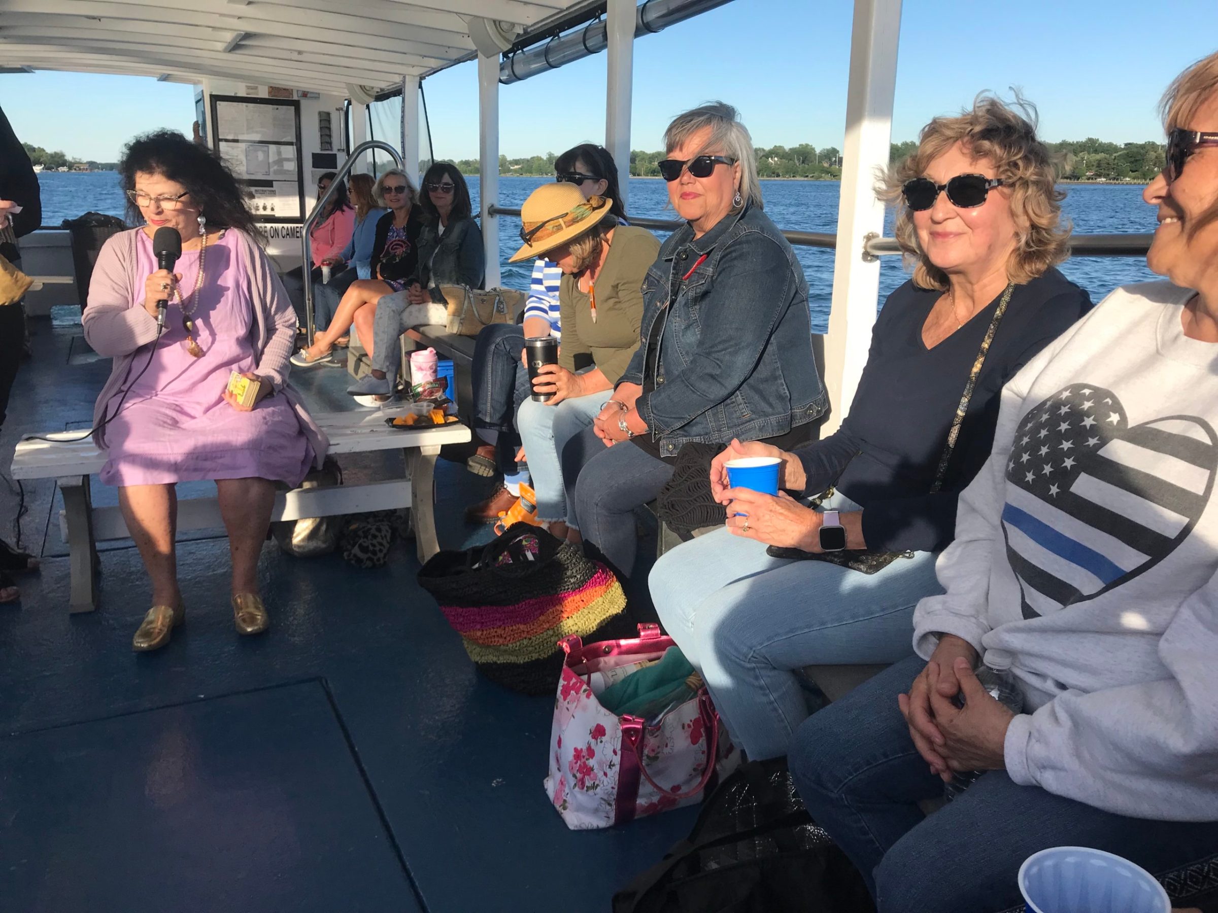 a group of people sitting on a bench
