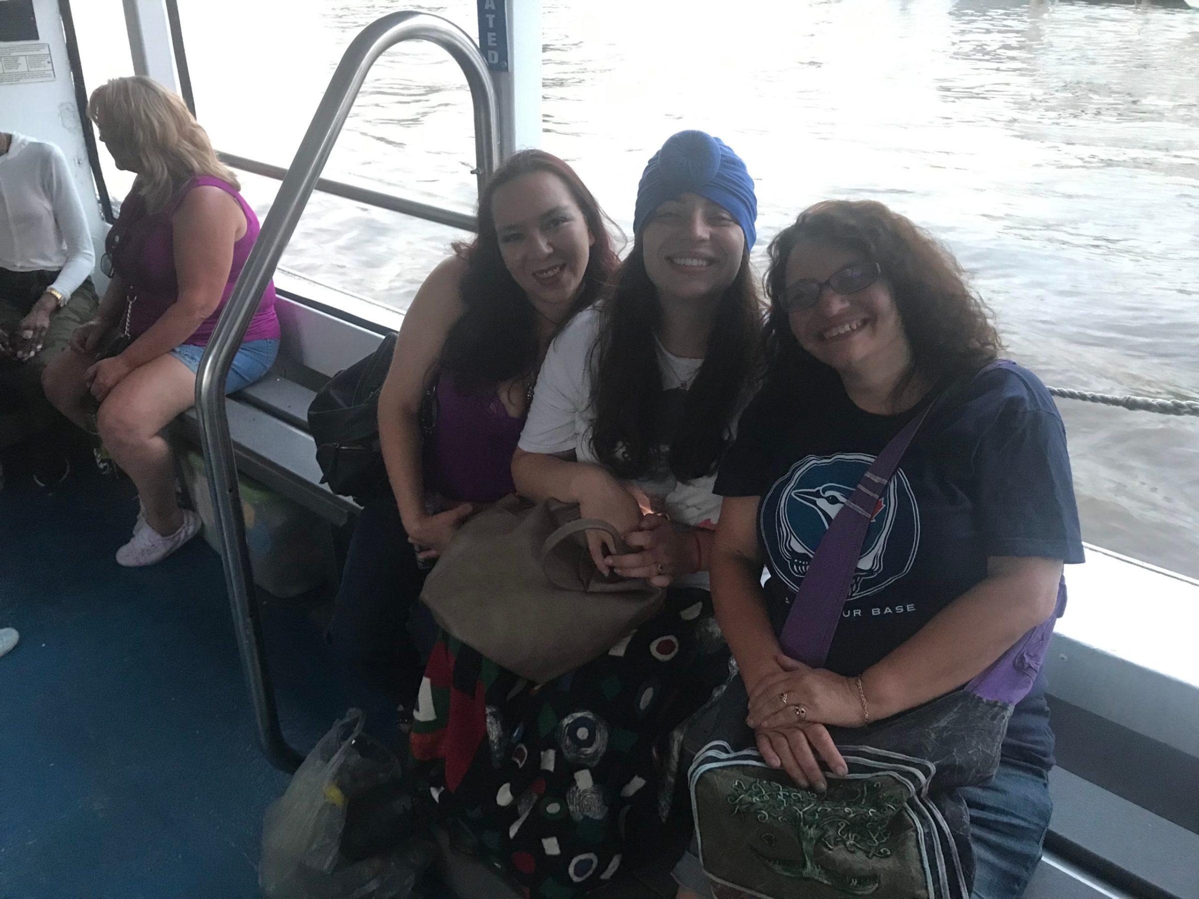 a group of people sitting posing for the camera