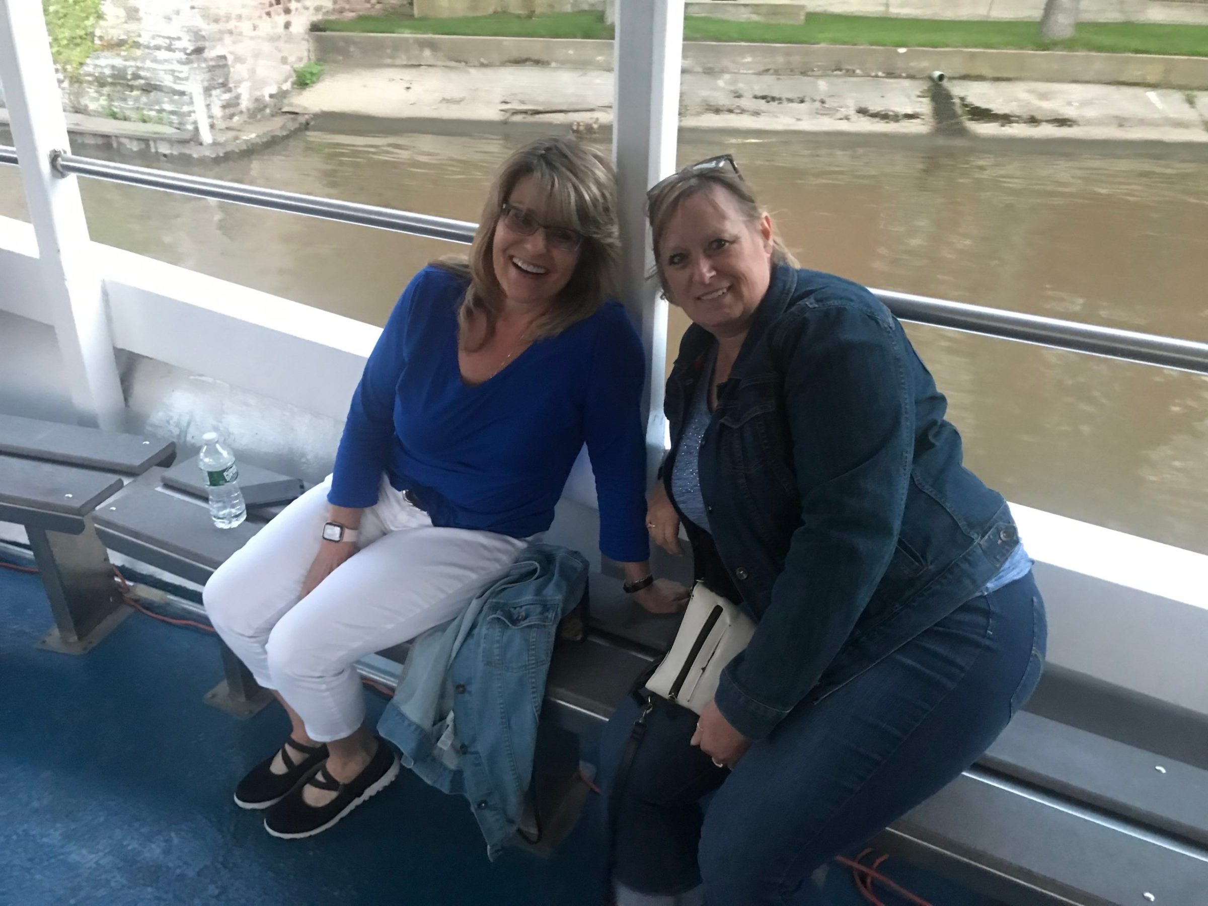 a woman sitting on a bench