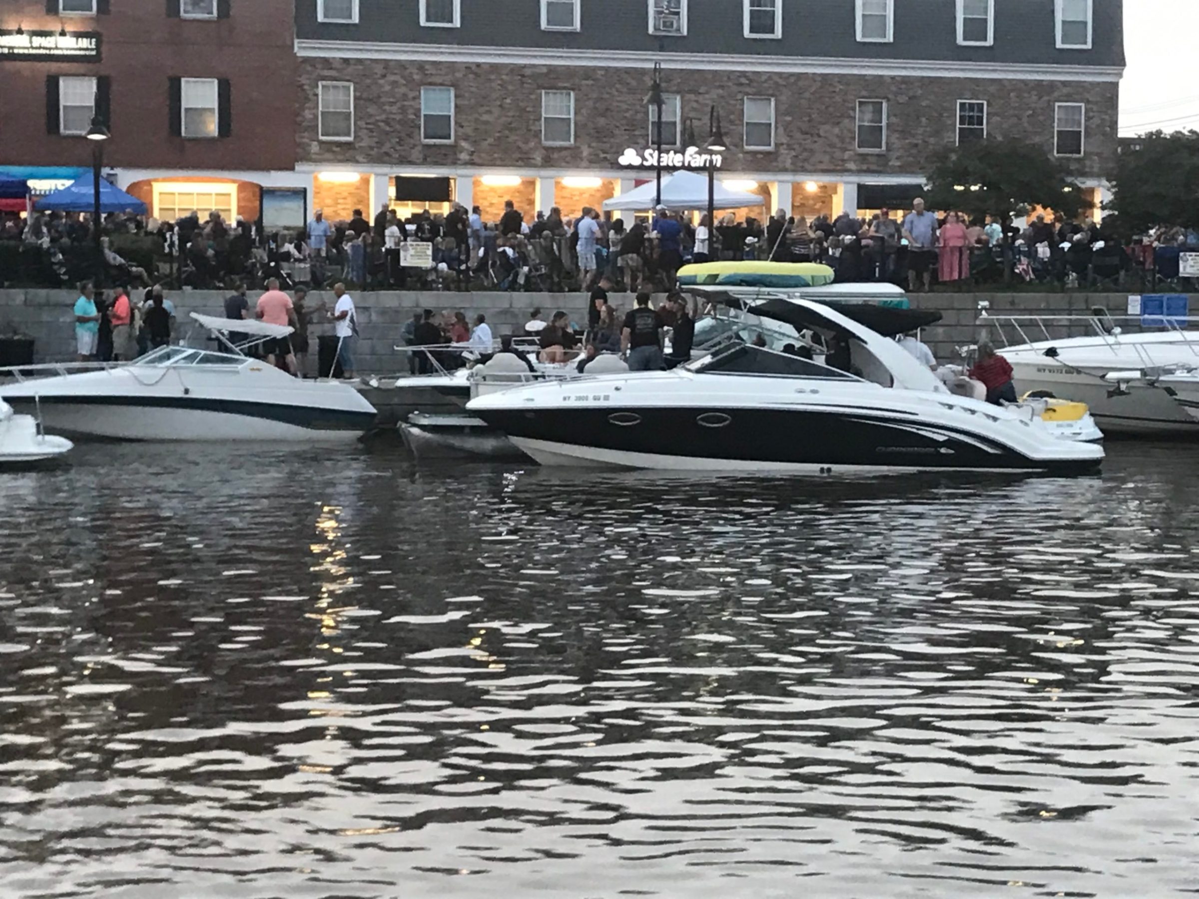 a group of people on a boat in the water
